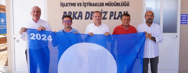 Ayvalık’ta Göndere Mavi Bayrak Çekildi… fotoğraf
